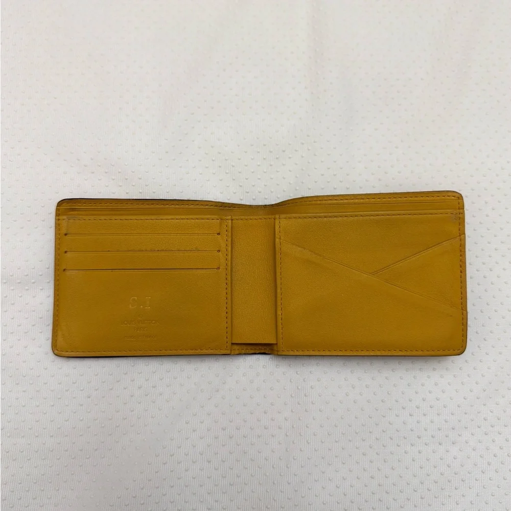 LOUIS VUITTON - MUSTARD YELLOW TAURILLON LEATHER BIFOLD WALLET